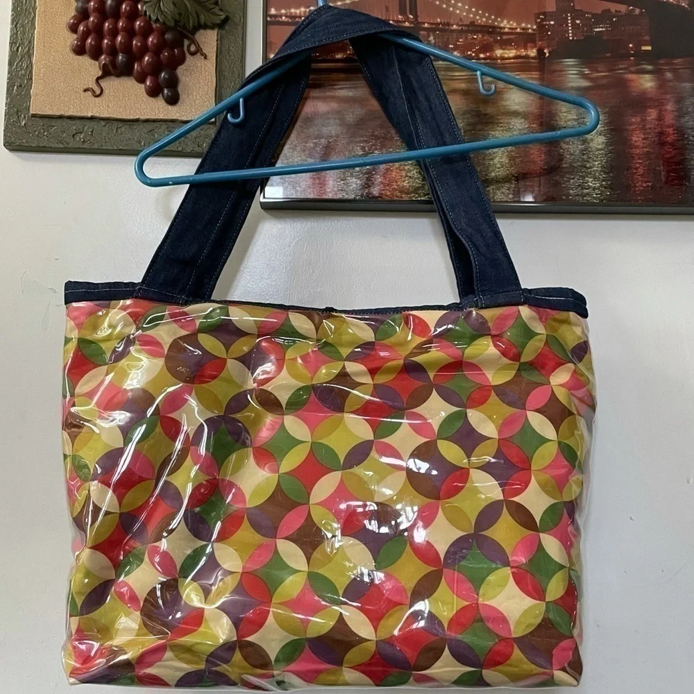 Free Large Diaper Travel Baby bag & the fabric book w. Purchase of $25+